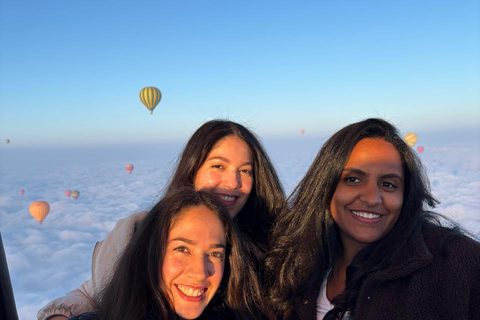 Passengers in flight above a sea of clouds near Marrakech